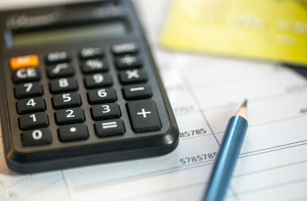 calculator numbers paper closeup finance concept